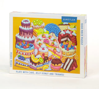 Kinstler Puzzles’ 1,000 piece jigsaw puzzle, Plate with Cake, Jelly Donut, and Tiramisu, features desserts art by Los Angeles artist Pedro Pedro.