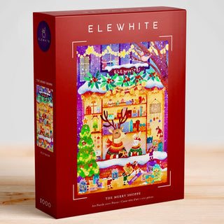 The Merry Shoppe | 1,000 Piece Jigsaw Puzzle by Elewhite comes in a red box featuring a festive illustration of a decorated shop with a reindeer, Christmas tree, and gifts. This premium puzzle displays original artwork and is labeled “THE MERRY SHOPPE” and “1,000 pieces” on the front.
