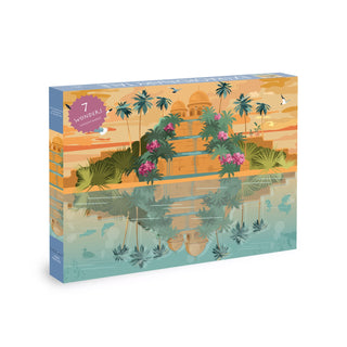 Immerse yourself in ancient wonders with Olleo Puzzles’ “The Hanging Gardens of Babylon” 1,000 piece jigsaw puzzle—a captivating box featuring an illustration of a domed palace, palm trees, and flowers mirrored in tranquil water, perfect for any ancient world puzzle enthusiast.