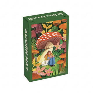 Sure! Here’s a rewritten sentence using your product data: The Trevell “Acorn Hat” 99 Piece Jigsaw Puzzle comes in a green box featuring an illustration of a seated woman reading beneath a large mushroom, surrounded by flowers and plants. “A CORN HAT” is printed on the side, and 1% of proceeds support 1% for the Planet.