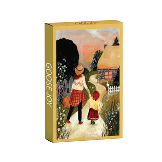 Goose Joy by Olleo Puzzles is a 99 piece jigsaw featuring an adult and child walking hand in hand toward a thatched cottage amid greenery and flowers at sunset—an ideal family puzzle for cozy evenings.