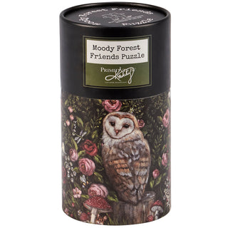 The Moody Forest Friends | 500 Piece Jigsaw Puzzle by Primitives by Kathy features a charming owl amid flowers and mushrooms—a delightful spring activity for woodland animal puzzle fans.