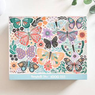 Spaghetti Tree's Butterfly Bouquet 1,000 Piece Jigsaw Puzzle features a vibrant box cover with butterflies, flowers, and leaves.