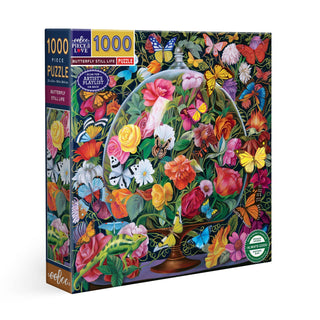The eeBoo Butterfly Still Life | 1,000 Piece Jigsaw Puzzle showcases Naomi Devil's enchanting still life with colorful butterflies, flowers, and greenery in a glass dome set against a dark background.