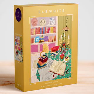 Enjoy assembling the Lamplight Reverie 500 Piece Jigsaw Puzzle by Elewhite, featuring original artwork of a cozy, book-filled room adorned with an open book, tempting desserts, a classic gramophone, and a green tablecloth bathed in warm lamplight—all beautifully crafted on premium puzzle board for a delightful puzzling experience.