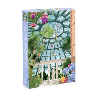 In the Greenhouse | 1,000 Piece Jigsaw Puzzle by Olleo Puzzles features an illustrated glass greenhouse inspired by the Royal Greenhouses of Laeken, filled with tropical plants and a statue—a tribute to Belgian heritage.
