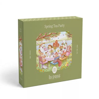 A green la pauz box labeled “Spring Tea Party” with an illustrated image of animals enjoying tea at an outdoor table, featuring a 500-piece jigsaw puzzle.