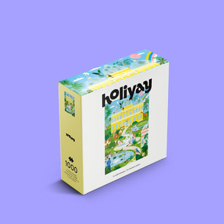 The Botanical Garden | 1,000 Piece Jigsaw Puzzle by Holiyay Puzzles comes in a box featuring Laura Lhuilier’s colorful illustration of a vibrant garden with a yellow building, set against a light purple background.