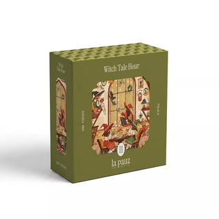 A green box labeled Witch Tale Hour contains a 280-piece mini jigsaw puzzle illustrated by Folala, featuring a colorful scene of witches gathered around a table by a window. The brand la pauz is printed on the box.