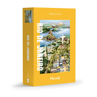 The Piecely Rio De Janeiro 1,000 Piece Jigsaw Puzzle features a vibrant illustration of Christ the Redeemer and Sugarloaf Mountain—perfect for fans of travel-themed art.
