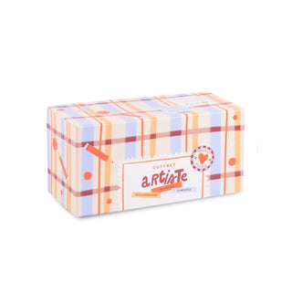 Rectangular pastel plaid box in orange, blue, and beige from Trevell. Labeled "Cofret Artiste Box Set," it contains 12 artist-themed 99-piece jigsaw puzzles.