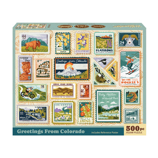 Greetings from Colorado | 500 Piece Jigsaw Puzzle box featuring a collage of hand-illustrated, postage-stamp-style depictions of state landmarks, wildlife, and outdoor activities.