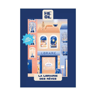 Illustration of a pastel bookstore with LIBRAIRIE and OPEN signs, blue border, and "LA LIBRAIRIE DES RÊVES"—the perfect French-made 99 piece jigsaw puzzle for dreamers by Heol Editions.