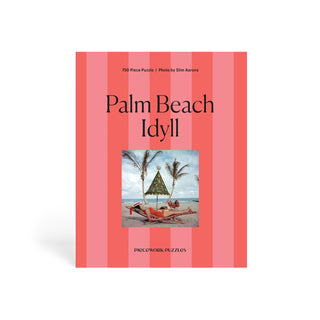 Palm Beach Idyll | 750 Piece Jigsaw Puzzle by Piecework Puzzles features a vintage beach scene with sunshades and palm trees—perfect for relaxing with classic mid-century style.