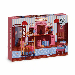 La Réception 500-piece jigsaw puzzle by Trevell featuring an illustrated vintage hotel lobby with a reception desk, a luggage cart, and stacked suitcases.