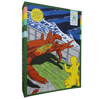 Crustacea | 1,000 Piece Jigsaw Puzzle by Bridgetown Puzzles features artwork by Vincent Morrelli of a large red crab on a ship’s deck facing a person in a yellow raincoat, with ocean waves in the background; 10% of sales go to the artist.