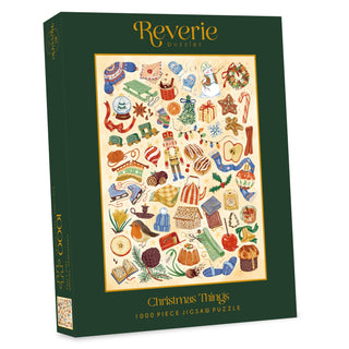 A box of Reverie Puzzles’ Christmas Things | 1,000 Piece Jigsaw Puzzle featuring illustrated holiday-themed objects on the cover.