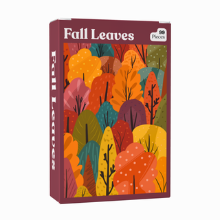The Fall Leaves | 99 Piece Jigsaw Puzzle by Puzzledly is a pocket-sized mini puzzle box featuring an illustration of vibrant autumn trees and foliage in orange, red, yellow, and green. Its matte finish makes it ideal for on-the-go puzzling.