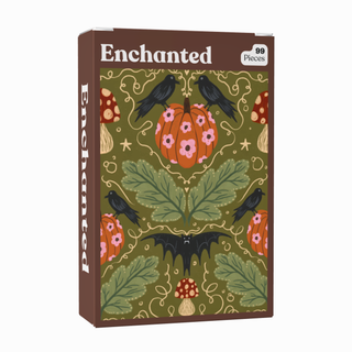 Here’s a rewritten version of the sentence using your product data: The Enchanted | 99 Piece Jigsaw Puzzle by Puzzledly is a pocket-sized puzzle box featuring a smooth matte finish and an olive green background adorned with black birds, bats, pumpkins, mushrooms, and leaves.