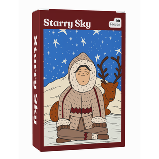 A Puzzledly Starry Sky 99 Piece Jigsaw Puzzle box showing a person in winter clothing sitting in the snow next to a reindeer under a starry sky.