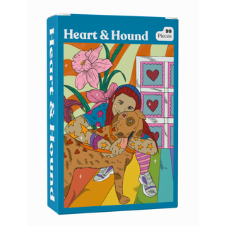 Heart & Hound 99-piece pocket-sized jigsaw puzzle featuring an illustration of a person hugging a dog against a colorful, patterned background.