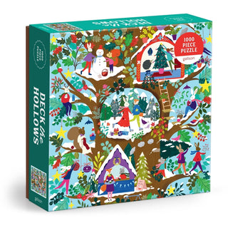 Deck the Hollows | 1,000 Piece Jigsaw Puzzle by Galison is a delightful holiday puzzle illustrated by Flora Waycott, showcasing vibrant winter scenes with treehouses, people, animals, snowmen, and festive decorations.
