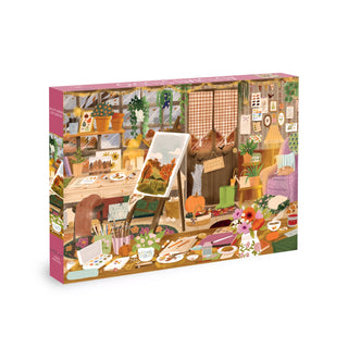 Experience hours of relaxation as you assemble the Autumn Studio | 1,000 Piece Jigsaw Puzzle from Olleo Puzzles. This colorful puzzle features an artful illustration by Florine Le Richon, depicting a cozy art studio filled with plants, art supplies, paintings, and a window revealing beautiful autumn scenery. The completed puzzle measures 26.8″ x 18.9″.