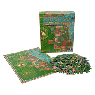 Shown on a white background: Transit Tees' Prairie Style Neighborhood Map | 1,000 Piece Jigsaw Puzzle includes the box, completed reference sheet, and puzzle pieces—Chicago architecture inspired.