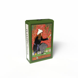 The Penny Puzzle Planting Seeds | 99 Piece Jigsaw Puzzle comes in a green vintage-style rectangular box featuring a gardening woman illustration and "PLANTING SEEDS" text, with a charming 99-piece mini puzzle inside.