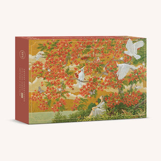 Discover the Flame Tree | 1,000 Piece Jigsaw Puzzle by The Puzzle Theory, featuring a pearlescent illustration inspired by Jun Sato: a woman beneath a vibrant flame tree with red flowers, surrounded by white birds and lush greenery.