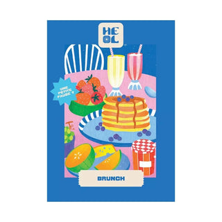 Enjoy assembling "Brunch," a charming 99-piece jigsaw puzzle from Heol Editions, featuring an illustration of pancakes, fruit, drinks, and jam on a blue background. Made in France.