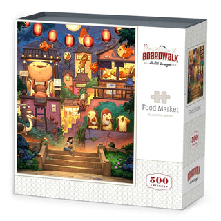 Box of a 500-piece Boardwalk Puzzle Company jigsaw puzzle titled “Food Market,” featuring Andrew Bosley’s illustration of animals in a vibrant market scene filled with lanterns and food stalls.