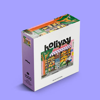 The Matin Doré 1,000-piece jigsaw puzzle by Holiyay Puzzles features vibrant bakery illustrations on a white background with a light purple backdrop and a premium matte finish for an elegant look.