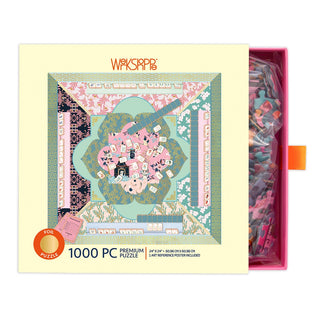 Let’s Play Mahjong is a 1,000-piece jigsaw puzzle by WerkShoppe. The partially open box displays Teresa Chan’s geometric, colorful Mahjong-inspired art on the lid, with loose pieces visible inside.