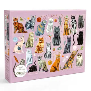 The 1canoe2 Feline Friends Cats | 1,000 Piece Jigsaw Puzzle comes in a box decorated with charming illustrations of cats in different colors and poses, all set against a pink background with playful yarn balls and toys.