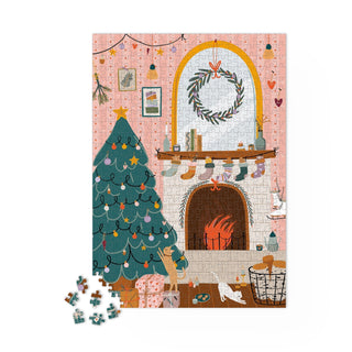 Enjoy “By the Fireside,” a 1,000-piece jigsaw puzzle by Maison Joliette featuring a festive Christmas tree, gifts, and fireplace with stockings—a charming holiday challenge for adults.