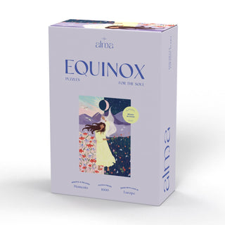 Alma Puzzles' Equinox is a 1,000 piece jigsaw puzzle featuring an illustrated woman in a yellow dress reaching for the moon, labeled “Puzzles for the Soul.”.