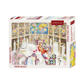 The Paper Palace 1,000 Piece Jigsaw Puzzle box featuring an Alexa Guariglia illustration of a whimsical library filled with sculptures, paper scrolls, and bookshelves under a world map.