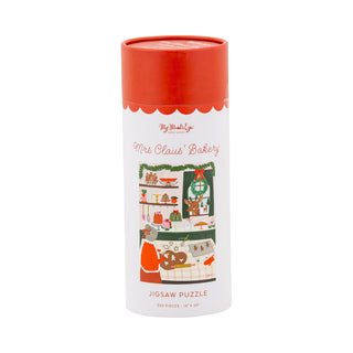 The Mrs Claus Bakery | 300 Piece Jigsaw Puzzle by My Mind’s Eye comes in a cylindrical box and features Mrs. Claus baking in a festive kitchen—perfect for hours of holiday fun.