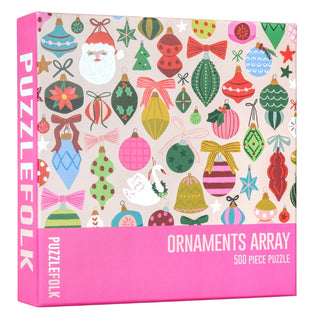 The Ornaments Array 500 piece jigsaw puzzle by Puzzlefolk features colorful Christmas ornaments on a pink and white background.