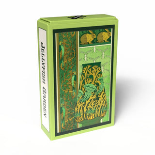 A green box labeled “Jellyfish Garden | 99 Piece Jigsaw Puzzle” by Penny Puzzle features artwork of plants, birds, rabbits, and fish in shades of green, yellow, and orange. Inspired by Maurice Pillard Verneuil’s iconic Art Nouveau vase designs, this vintage-style mini puzzle exudes timeless charm.