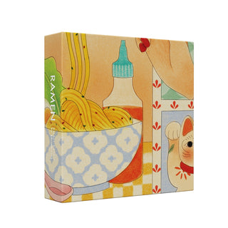 The Ramen | 1,000 Piece Jigsaw Puzzle by Cloudberries features an illustrated ramen bowl, sauce bottle, maneki-neko cat, and an arm on a patterned background—a perfect premium puzzle for ramen fans.