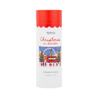 The Christmas in London | 500 Piece Jigsaw Puzzle by My Mind’s Eye comes in a cylindrical box adorned with a festive city illustration; this charming London-themed puzzle also includes a helpful poster to guide your assembly.