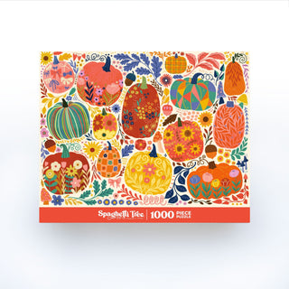 The Patchwork Pumpkins 1,000 Piece Jigsaw Puzzle by Spaghetti Tree features colorful patterned pumpkins and various flowers, with Spaghetti Tree branding on the box.