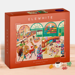 The Elewhite "My Favourite Place" 1,000-piece jigsaw puzzle features an illustrated scene of people and pets in a cozy, colorful cafe with arched windows and bookshelves, made from premium puzzle board. Boxed panorama format.