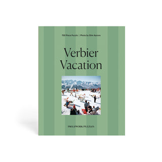 Piecework Puzzles' Verbier Vacation is a 750-piece jigsaw showing people relaxing in snowy mountains, packaged in a green striped box.