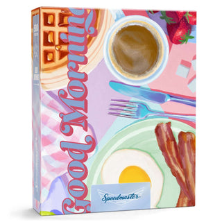 Good Morning | 500 Piece Jigsaw Puzzle by Boardwalk Puzzle Company features a breakfast scene with coffee, waffles, eggs, bacon, strawberries, utensils, “Good Morning” text, and the brand’s logo in a delightful contemporary art design.
