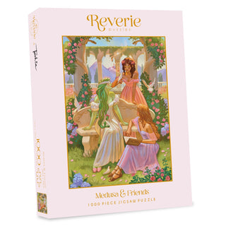 The Medusa and Friends 1,000 Piece Jigsaw Puzzle by Reverie Puzzles features whimsical outdoor art of three women in dresses, including one with green snake hair, making this a unique Medusa-themed puzzle.