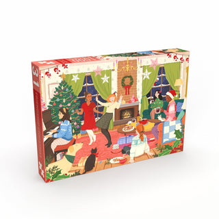 The Penny Puzzle “Friendship Christmas” 1,000 Piece Jigsaw Puzzle features an illustration of a festive living room filled with joyful people dancing, playing piano, exchanging gifts, and gathering around a beautifully decorated Christmas tree and fireplace—while pets rest on the rug—capturing the warmth of chosen family and togetherness.