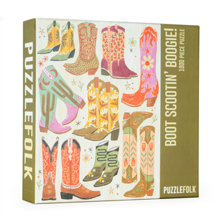 The Boot Scootin' Boogie! 1,000 Piece Jigsaw Puzzle by Puzzlefolk features vibrant cowboy boot illustrations and “BOOT SCOOTIN’ BOOGIE!” on the box.